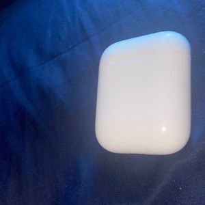2nd Gen Airpods with charging case & charger included.